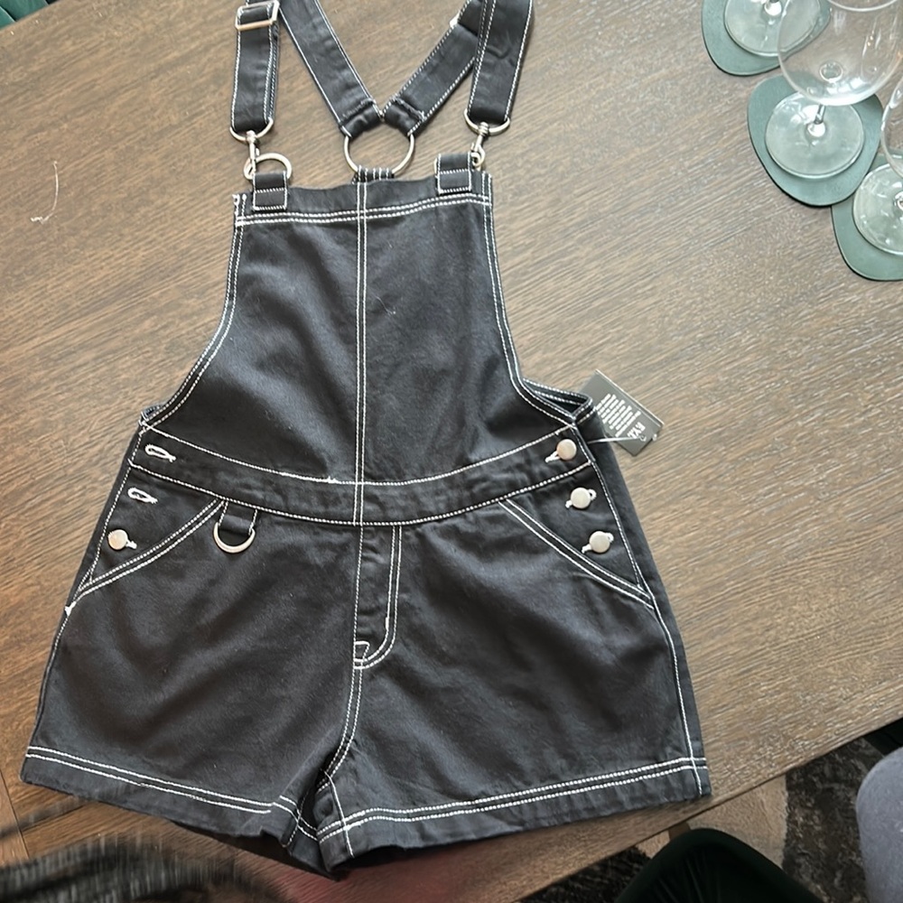 Has not been worn or tried on. The original price was $44.90.